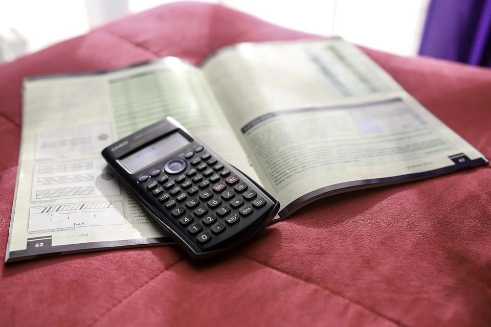 Scientific calculator on white printed notebook